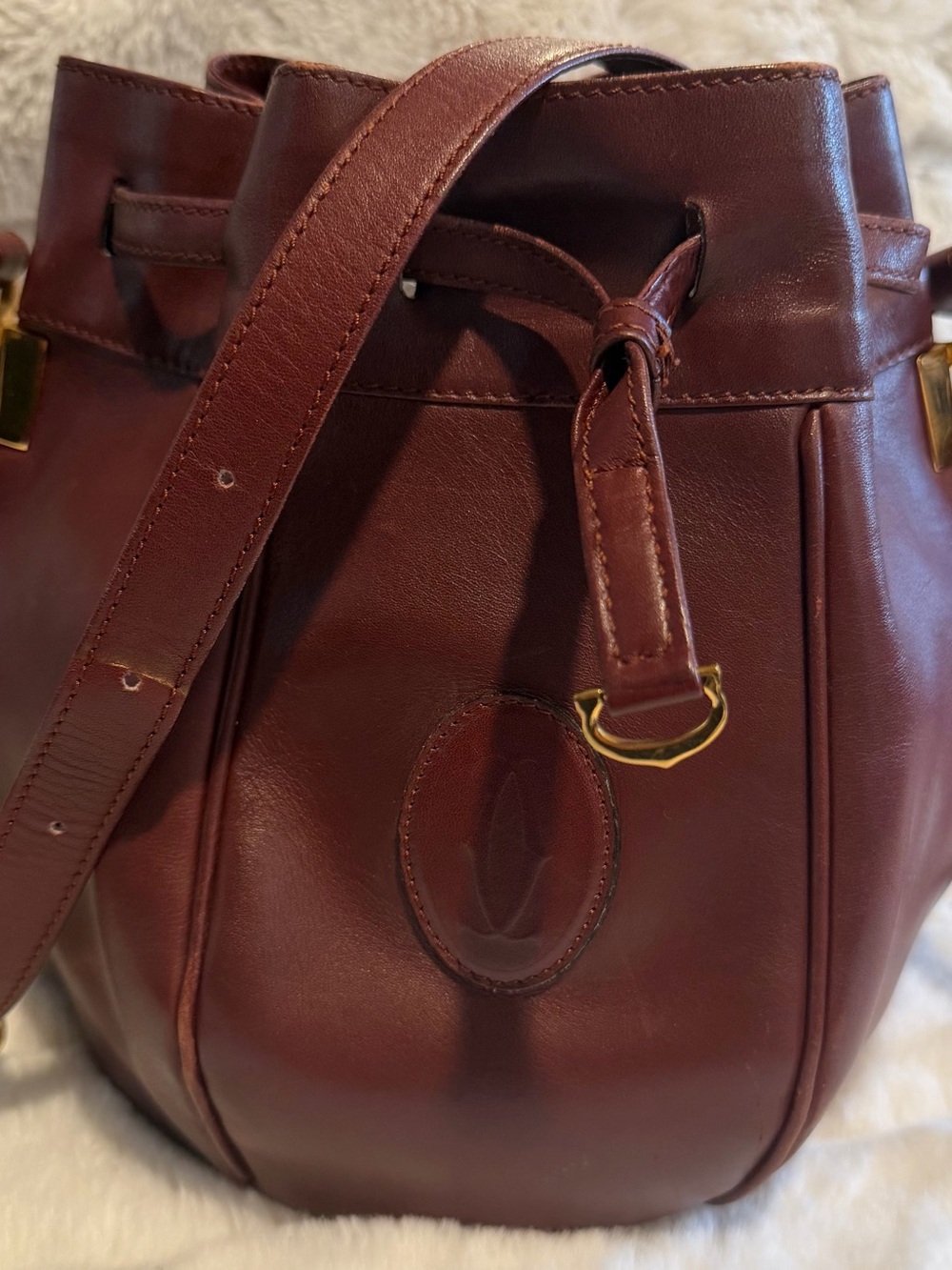 Cartier Burgundy Leather Drawstring Bucket Bag with Gold Hardware